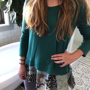 Long Anthropologie shirt with ruffle bottom